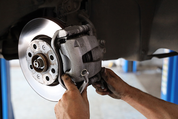 How to Tell If Uneven Brake Wear Is Coming From a Caliper or Its Slide Pins